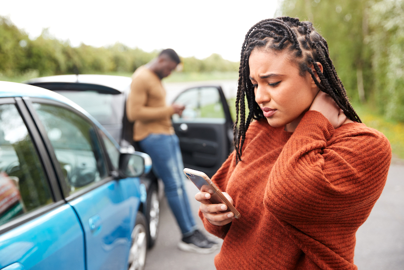 Female,Motorist,Involved,In,Car,Accident,Calling,Insurance,Company,Or Personal Injury Recovery Img